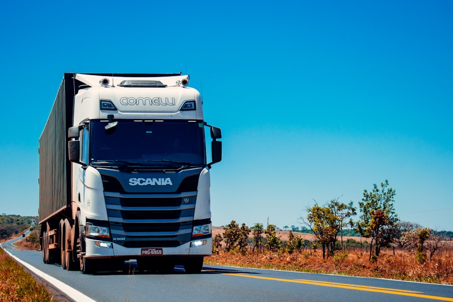 Car transporter truck loaded with vehicles for export
